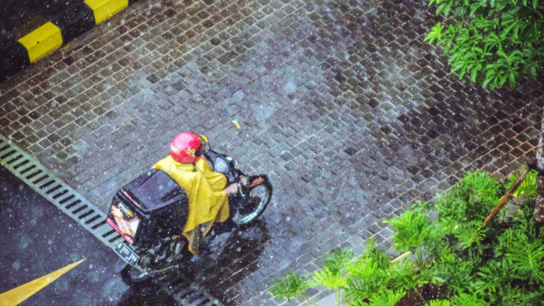 courier on a scooter