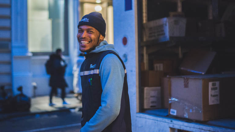 man at the back of a delivery truck
