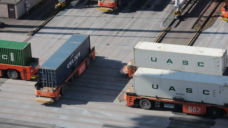 containers sitting on truck trailers