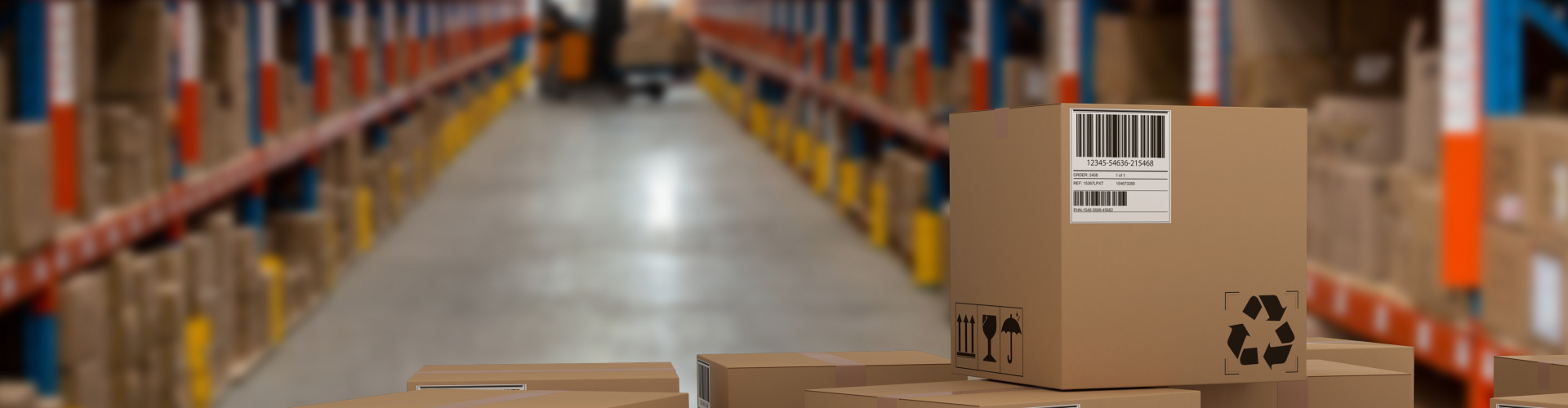 large warehouse with multiple barcode boxes in focus